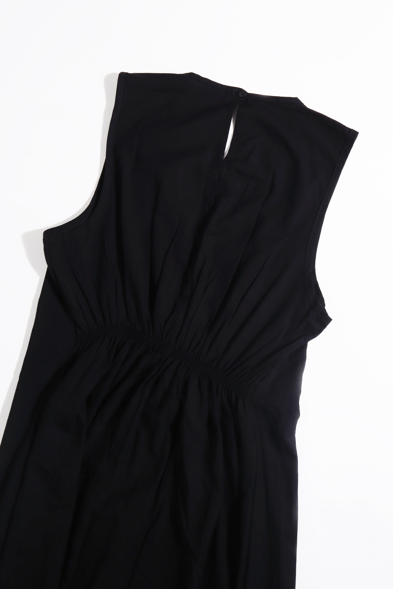 Dress hanging on hanger Cut sleeves  V neck